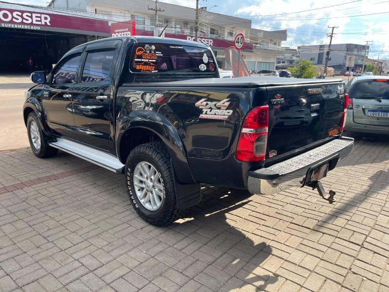 TOYOTA - HILUX - 2012/2013 - Preta - R$ 138.900,00